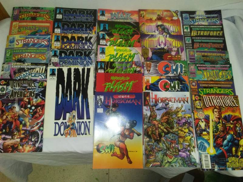 lot 145 image: 32 Comics Malibu, defiant Crusade, Ultra Force, strangers, dark Dominion, Avengers, plasm, Shi and more.
