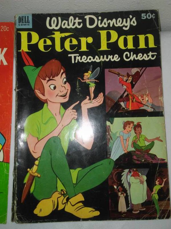 lot 217 image: 5 Walt Disney comics. Large Peter Pan 1952, bound, very good.