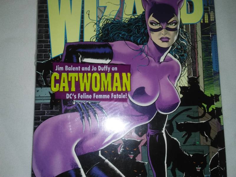 lot 241 image: 1994 wizard comic guide Catwoman, poster, Marvel, new in factory wrapping mint, X-Men