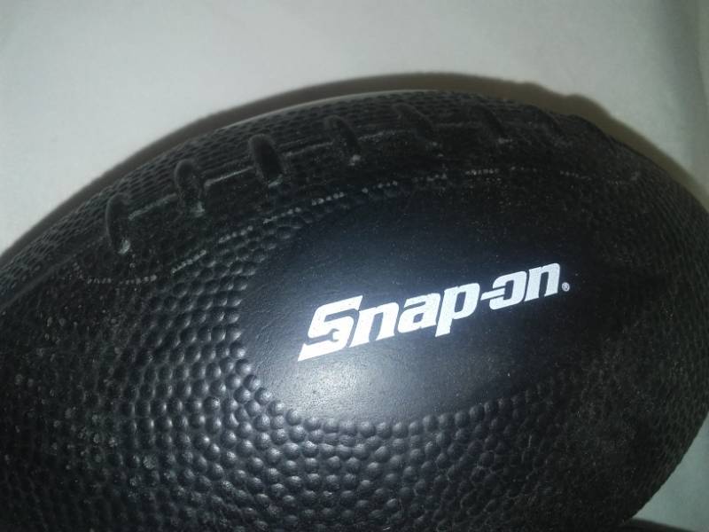 lot 200 image: 3 snap on foam footballs. Safe to throw at TVs, indoor outdoor dry or wet.