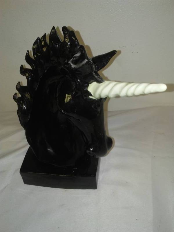 lot 307 image: Ceramic black unicorn 12.5 in different eyes from 304.