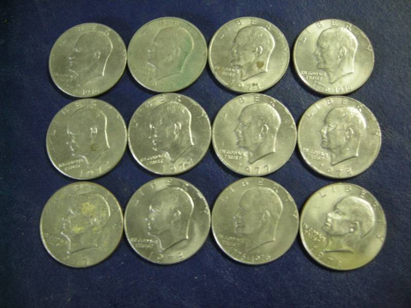 lot 43 image: 12 Eisenhower Dollar Coins