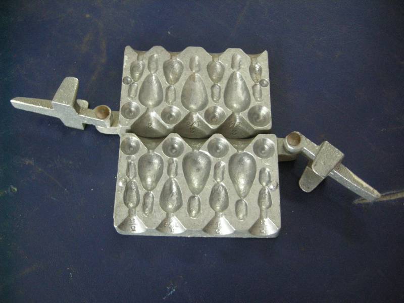 lot 104 image: Palmer Lead Sinker Mold