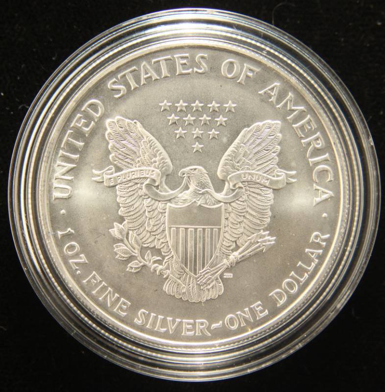 1986 AMERICAN SILVER EAGLE 1 TROY OZ. .999 FINE SILVER IN AIRTITE