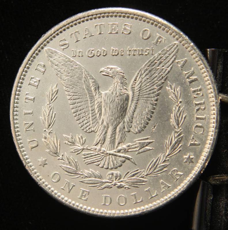 1889 MORGAN SILVER DOLLAR IN HIGHER GRADE
