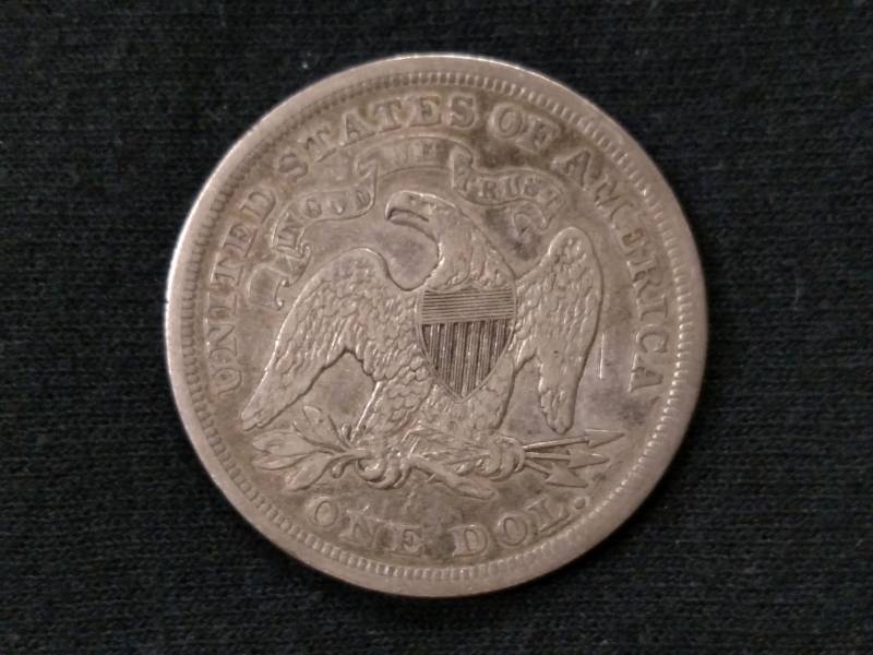 lot 6 image: 1872 Seated Liberty Silver Dollar...