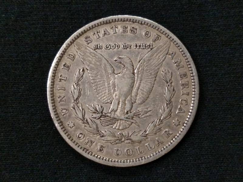 lot 9 image: 1879 Rev79 Morgan Silver Dollar...