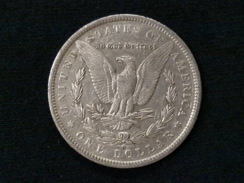 lot 12 image: 1891 O Morgan Silver Dollar...