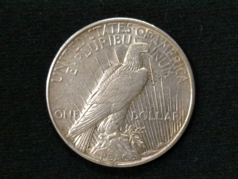 lot 19 image: 1922 D Peace Silver Dollar...
