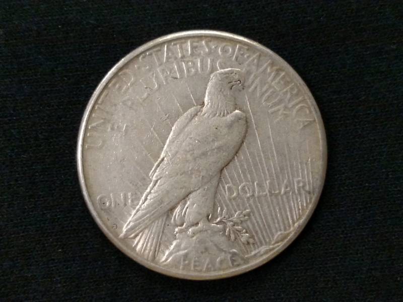 lot 21 image: 1923 S Peace Silver Dollar...