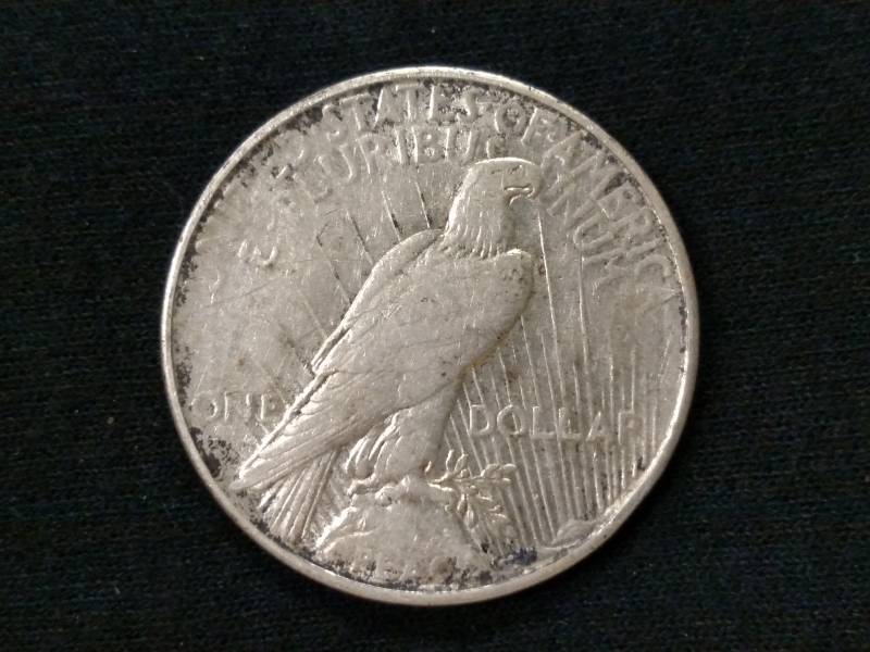 lot 27 image: 1934 D Peace Silver Dollar...