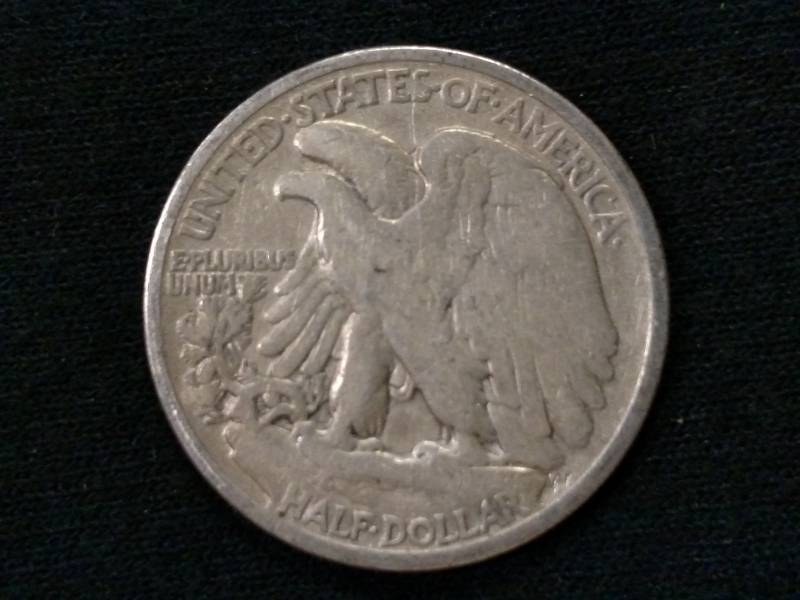 lot 35 image: 1935 Walking Liberty Silver Half Do...