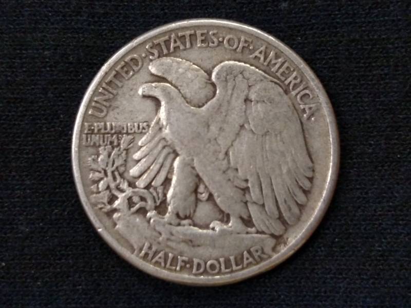 lot 49 image: 1944 Walking Liberty Silver Half Do...