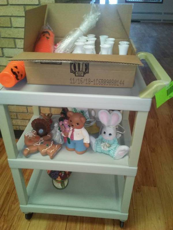 lot 51 image: 3 shelf resin roller cart with teddy bear and all contents.