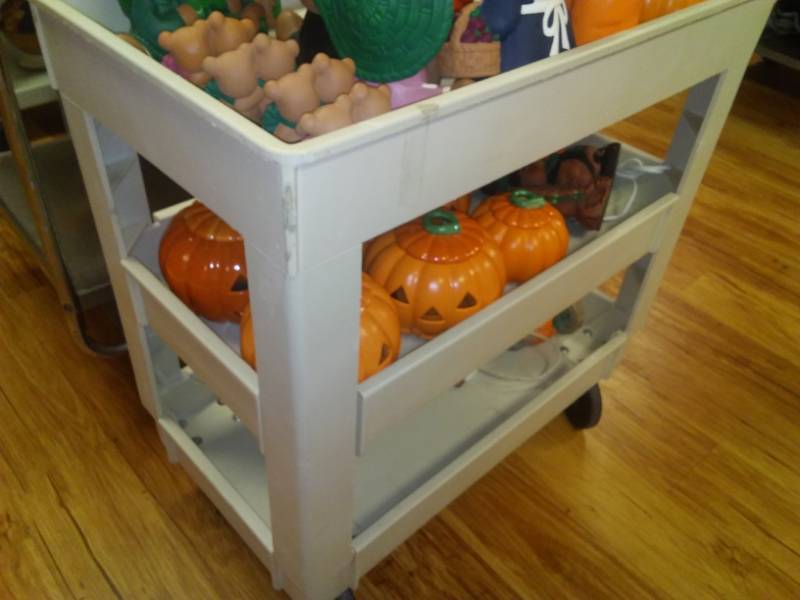 lot 55 image: Resin 3-shelf roller cart with fall contents