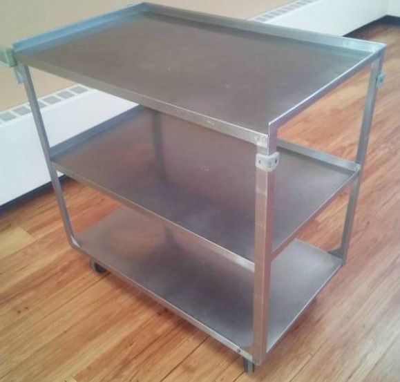 lot 70 image: Three tier stainless steel roller cart.