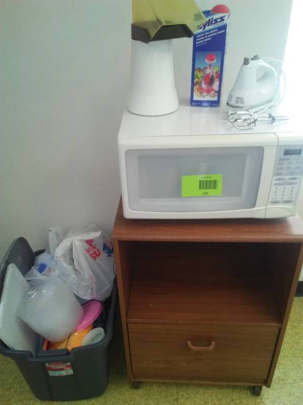 lot 221 image: Microwave with stand and more.