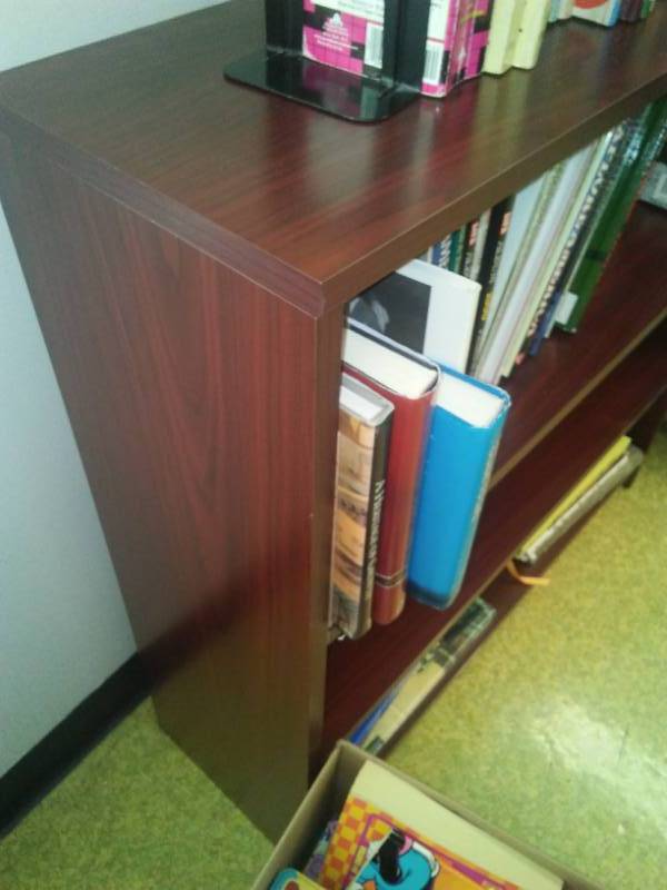 lot 227 image: Bookcase, books, games, activity books.