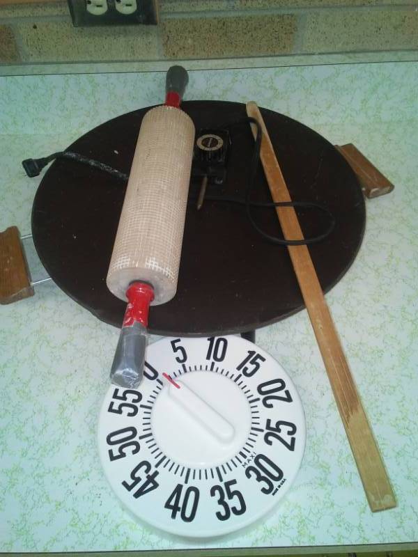 lot 238 image: Bethany lefsa Grill, stick and rolling pin.