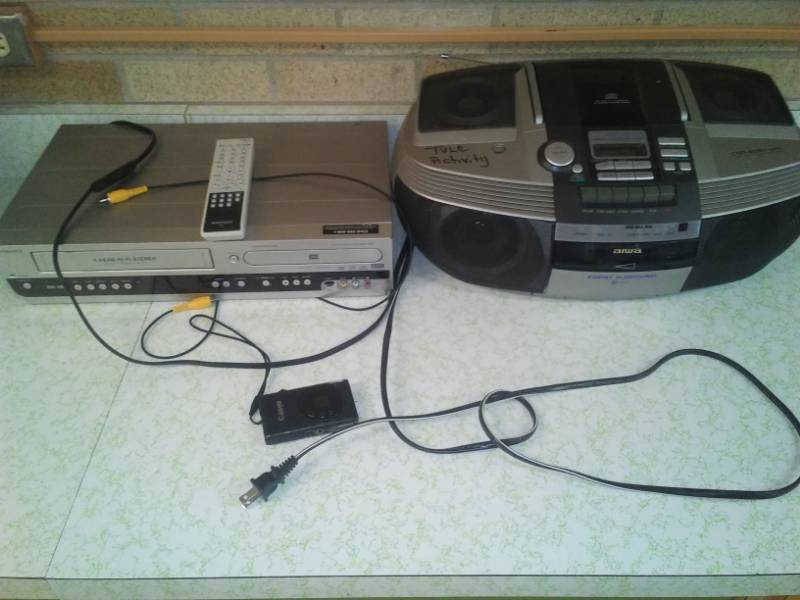 lot 243 image: Aiwa a.m.  FM CD cassette,  Magnavox VHS DVD