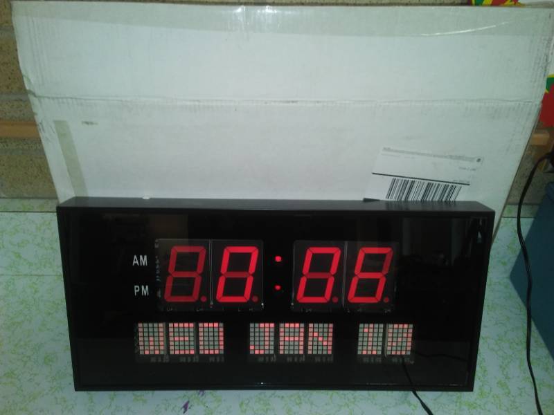 lot 246 image: Digital display clock, new in box.