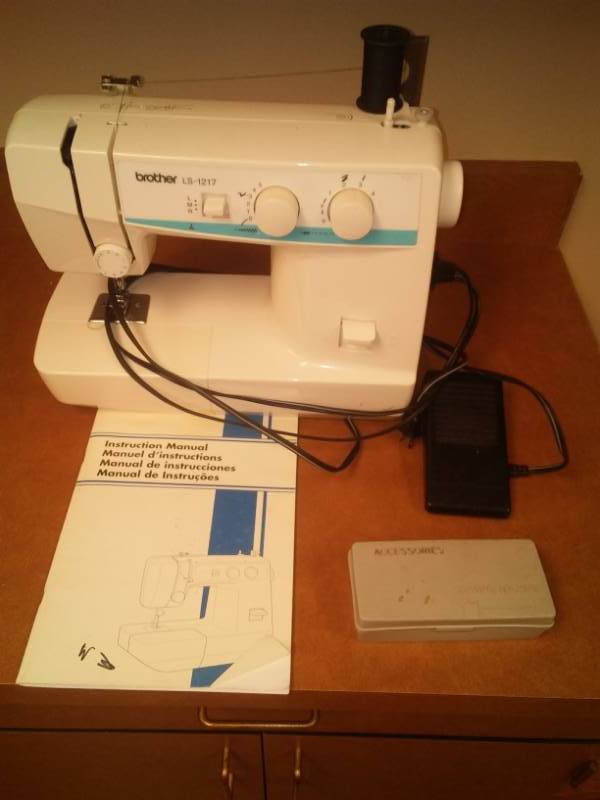 lot 303 image: Brother sewing machine,