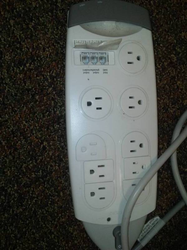 lot 311 image: 4 electrical surge protectors.