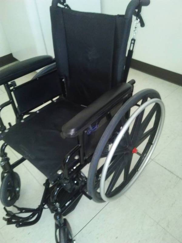 lot 115 image: Small-size wheelchair, brake release, Invacare