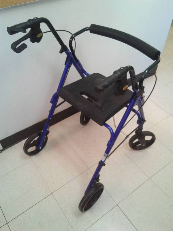 lot 373 image: Walker with wheels and brakes, seat,