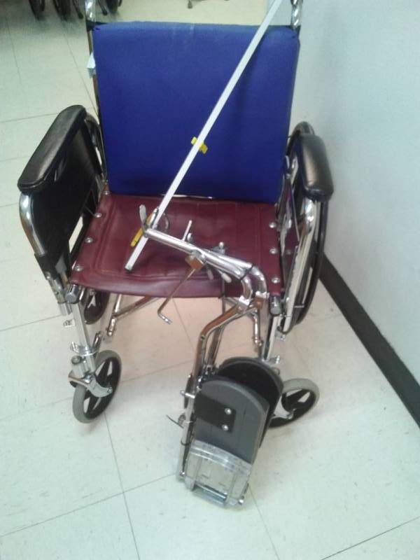 lot 392 image: Mismatched Wheelchair with grabber stabilizers