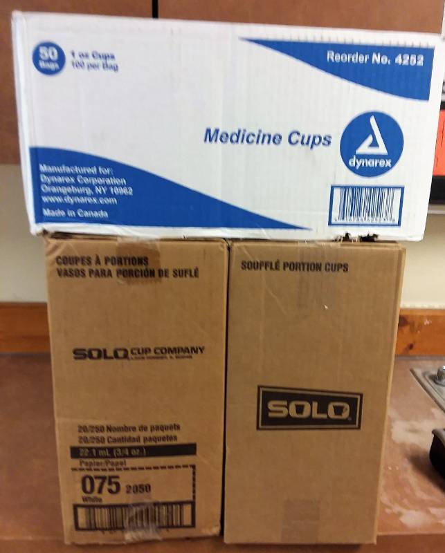 lot 425 image: Solo Cups (2) and Dynarex Med Cups...
