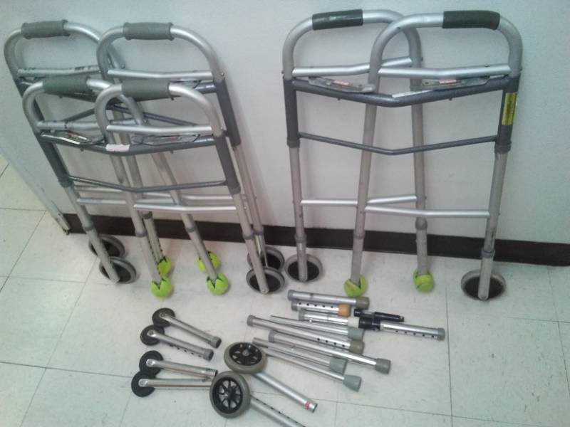 lot 395 image: 3 adjustable walkers, aluminum with extra legs and wheels.