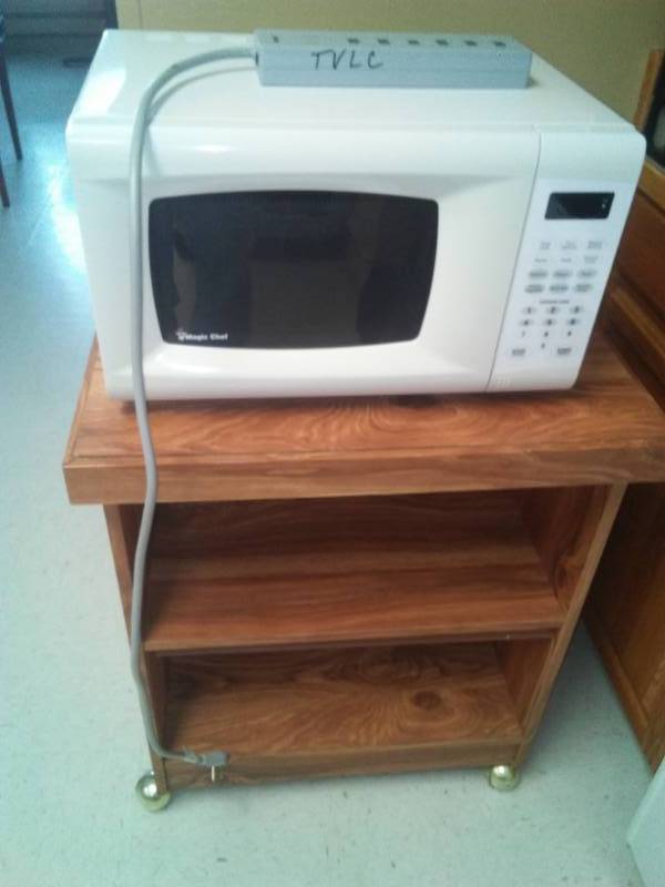 lot 355 image: Microwave and cart, surge protector.