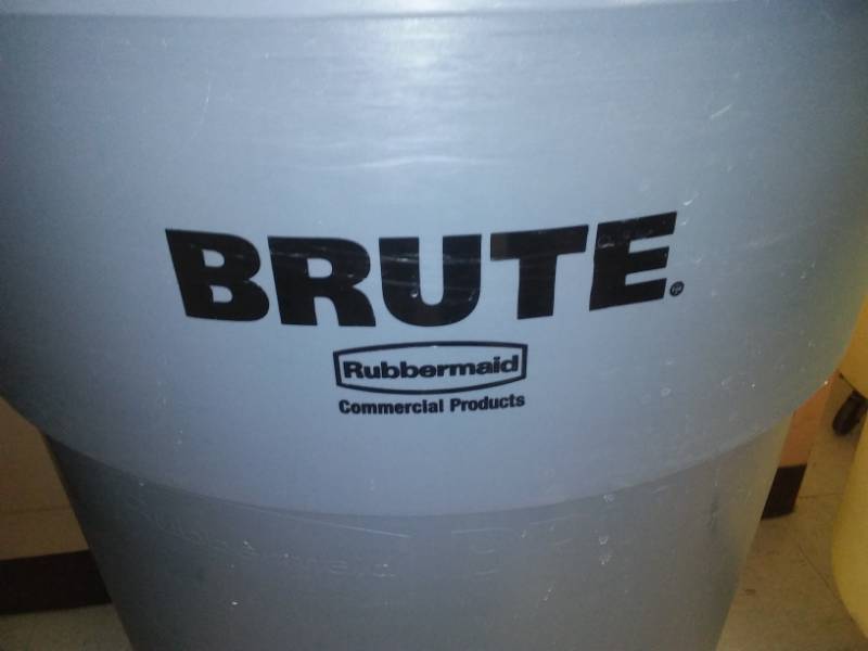 lot 168 image: 2 Rubbermaid 55 gal. Brute Rolling Trash Can 