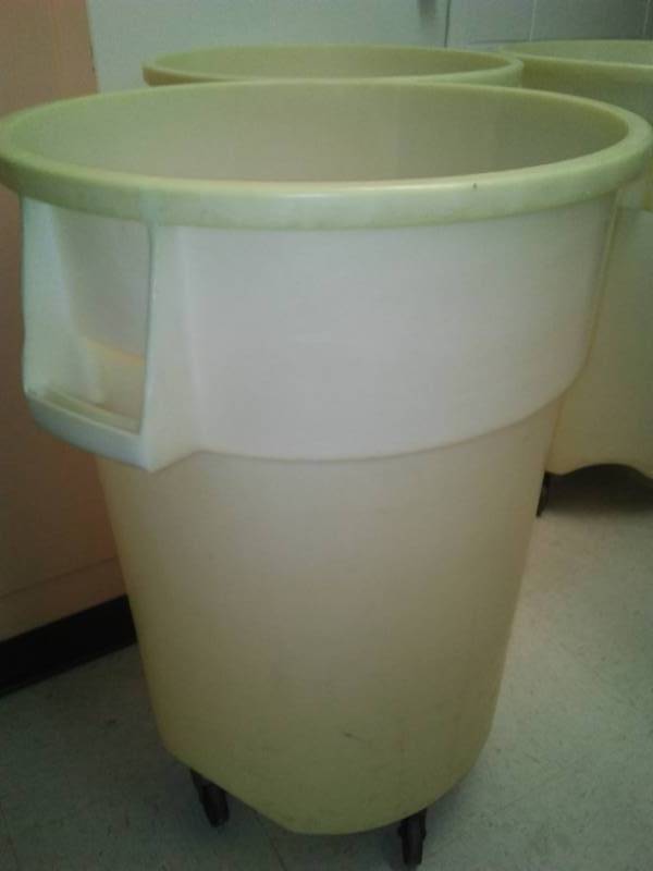 lot 169 image: 3 Rubbermaid 44 gal. Rolling Trash can. 