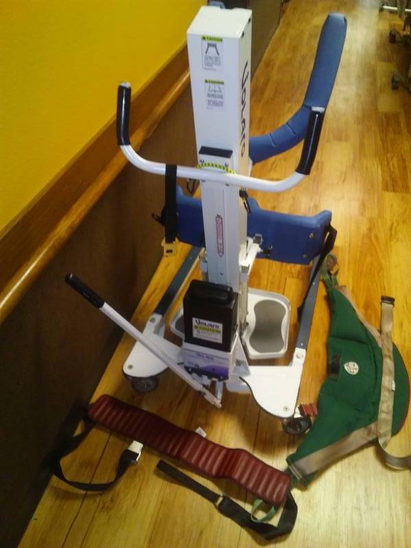 lot 421 image: Volaro patient lift- includes three batteries charger