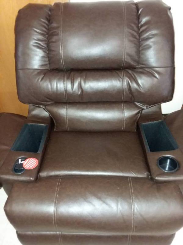 lot 577 image: New manual recliner, Brown imitation leather, excellent condition Width 38 in.