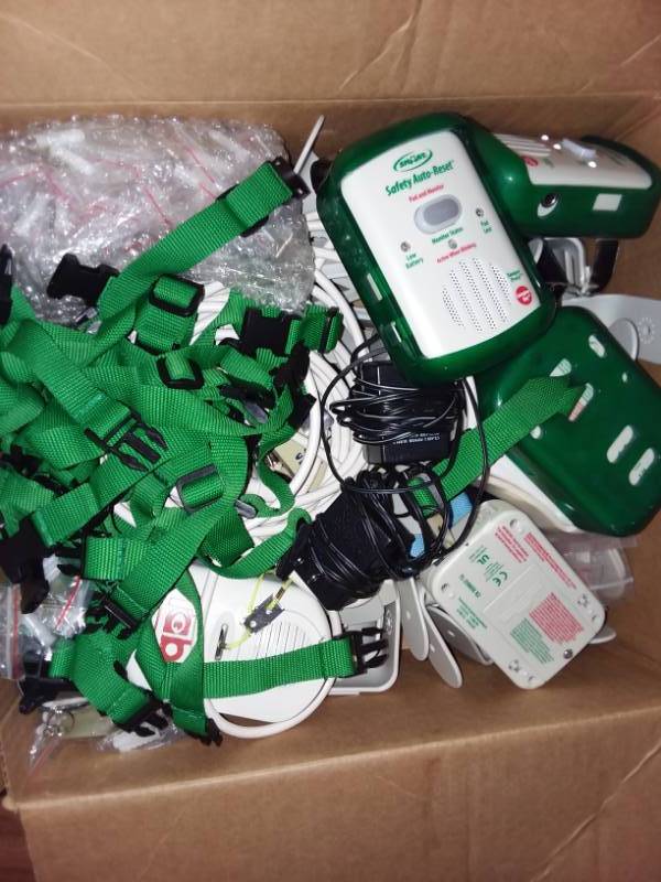 lot 591 image: Misc. Medical  Several Boxes (11) Medical Alarms chair  motion, Call Cords and more