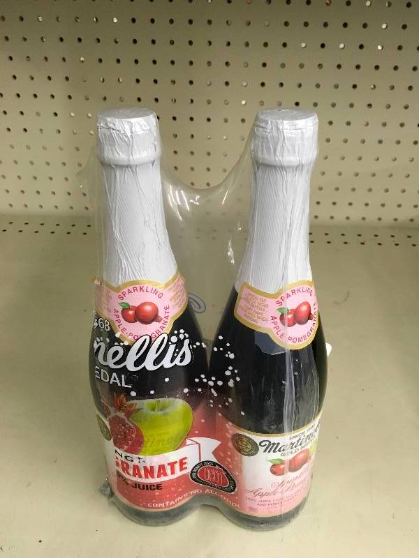 lot 154 image: Two Bottles Of Sparkling Apple Pomegranate Juice