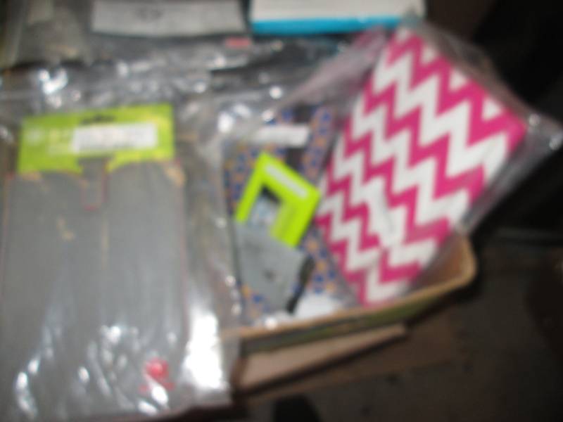 lot 203 image: box full of tablet covers and scree...