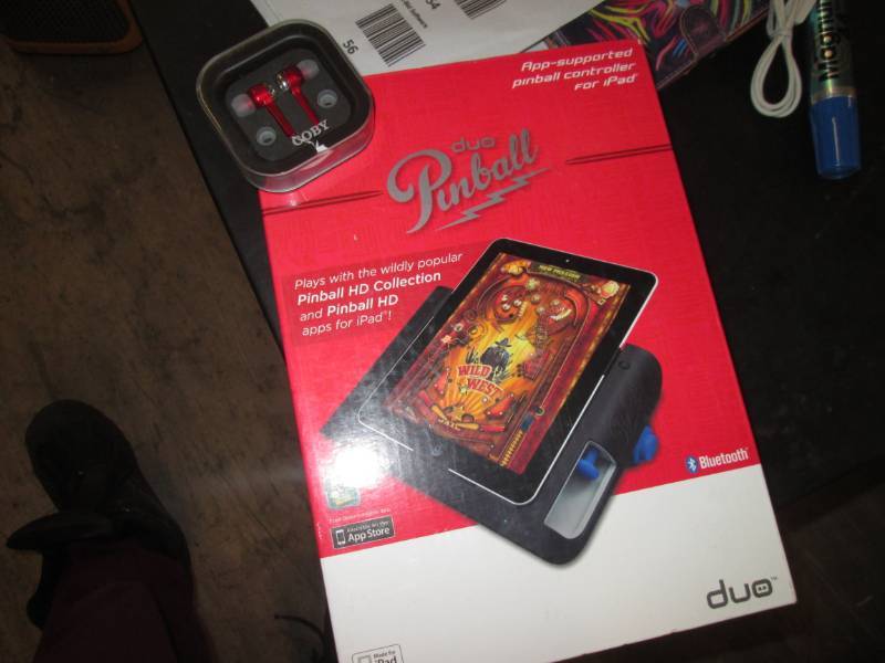 lot 259 image: Duo pinball and coby headphones...