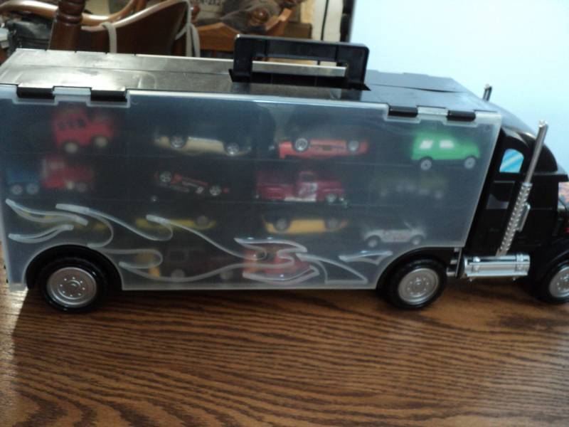 lot 15 image: Semi Filled with Matchbox Cars...