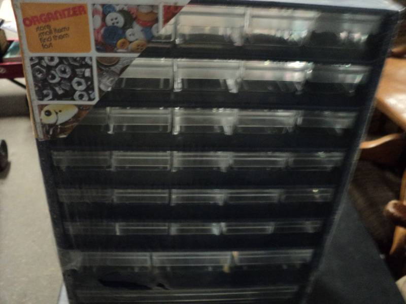 lot 63 image: Organizer- new...