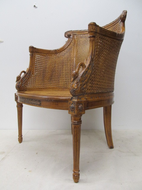 lot 3 image: Vintage Cane-Back Armchair wCarved Swan Handles