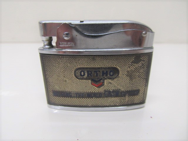lot 112 image: ORTHO Lighter