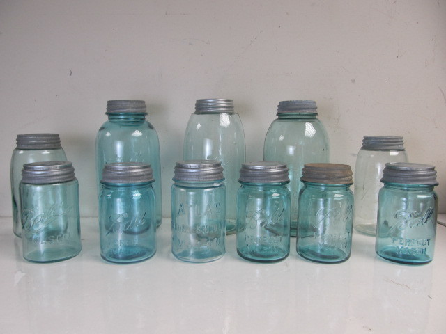 lot 98 image: Group of Vintage Blue Glass Canning Jars wZinc Lids