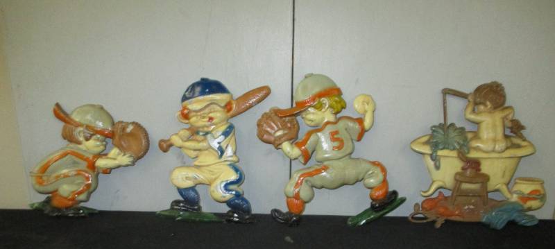 lot 62 image: Metal Baseball dcor and the fishing in the tub adorble