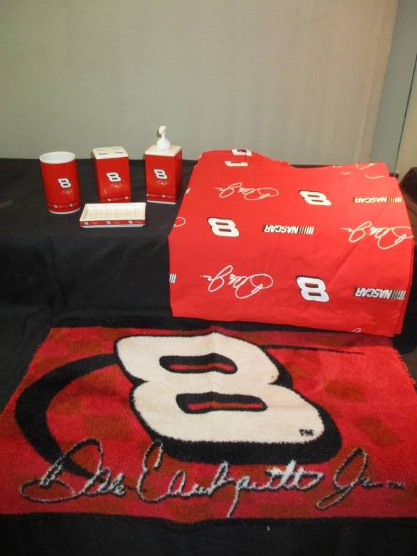 lot 170 image: Dale Earnhardt Bathroom Set Shower Curtain, rug, Glass, Toothbrush holder, soap holder, and soap dispenser