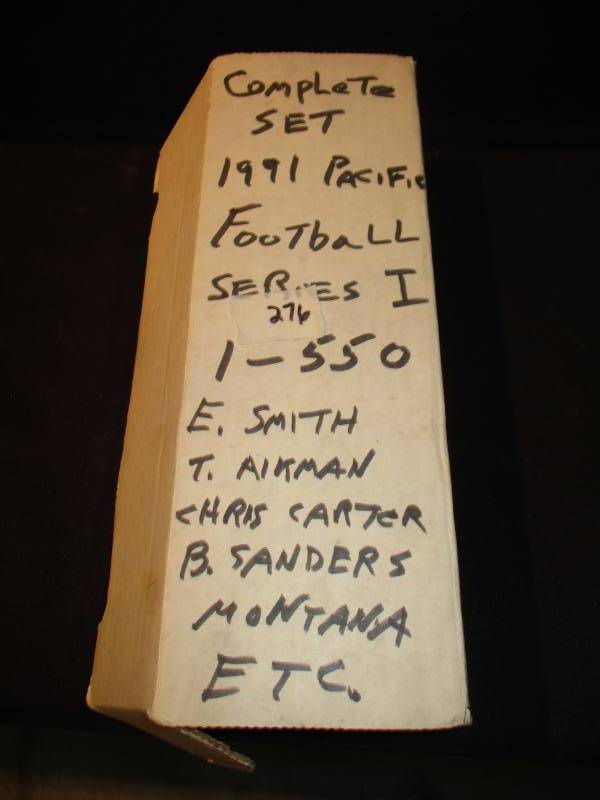 lot 196 image: Complete Set 1991 Pacific Football Series I 1-550 E. Smith T.Aikma, Christ Carter, B Sanders, Montana and Ect Says Complete but did not check