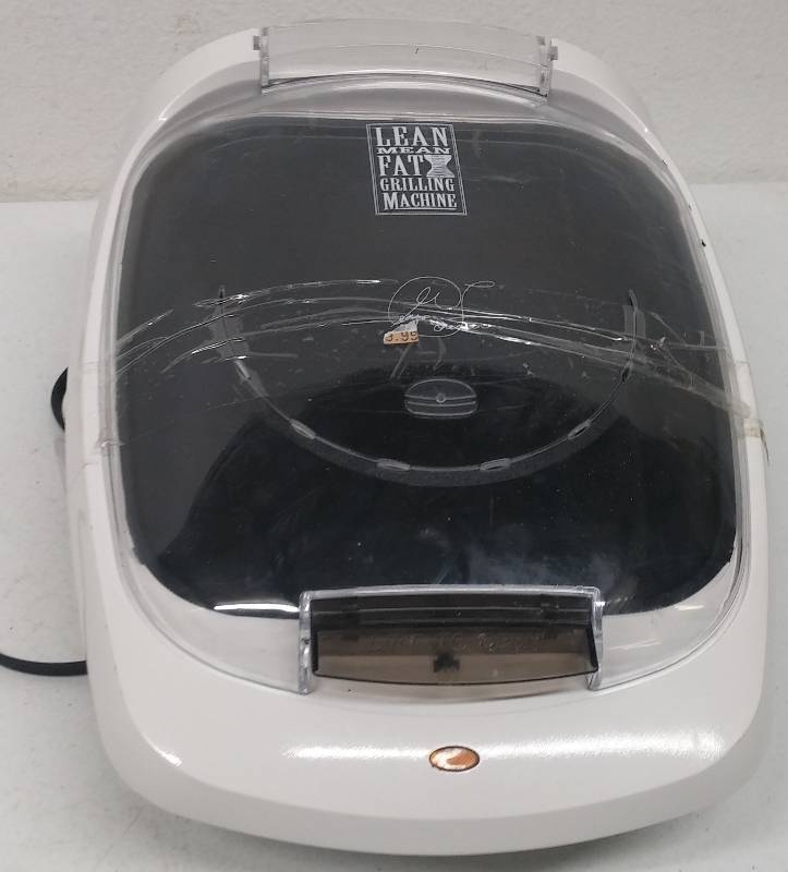lot 137 image: George Forman-Lean Mean Fat Reducing Grilling Machine